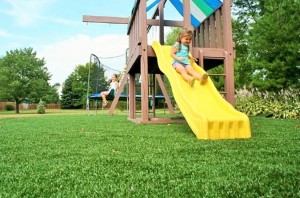 Children's playground with artificial grass